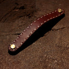 Dark brown double-hole double-layer cowhide with a hole distance of 13cm