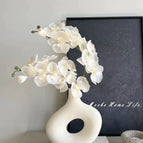 Two cream white + white special-shaped donut vases