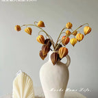 White ceramic vase without cape gooseberry